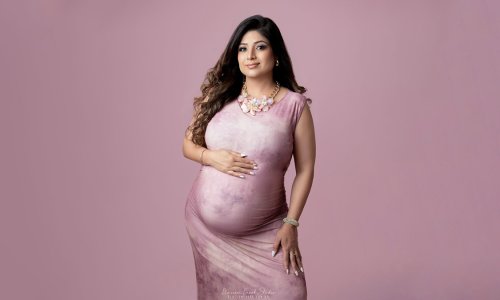 Newborn Photography Blog | Blossom Brook Studio 588 Pregnant woman in elegant pink dress.