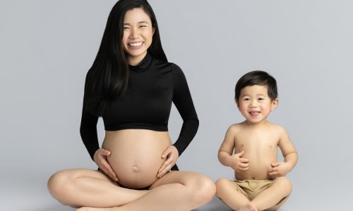 Newborn Photography Blog | Blossom Brook Studio 582 Pregnant woman with child, serene pose.
