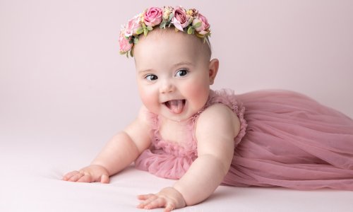 Newborn Photography Blog | Blossom Brook Studio 599 Beautiful baby girl in a pink dress and floral crown during a professional baby photography Sydney session by Blossom Brook Studio.