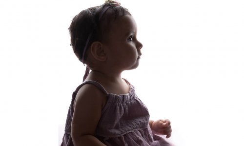 baby photography sydney baby girl in purple dress