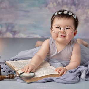 baby reading with glasses photo sydney