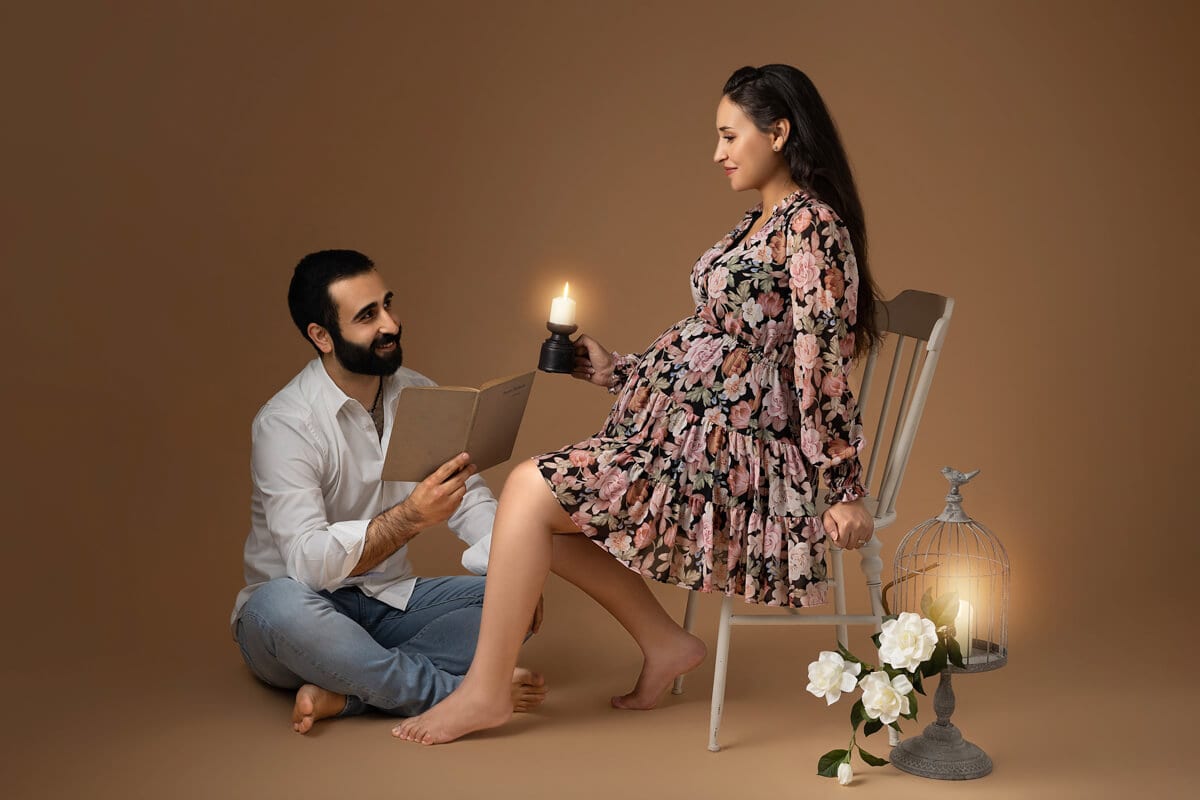 read book to the baby on maternity Photoshoot in Sydney