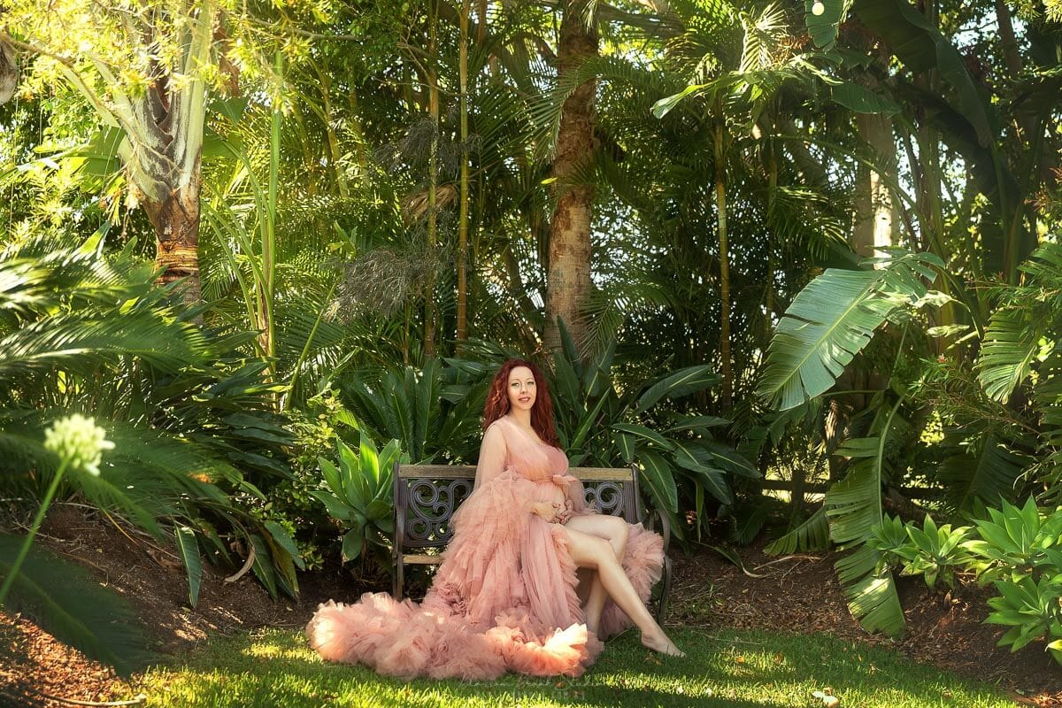 maternity photo in forest in pink dress sydney banjo paterson cottage