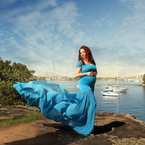 maternity photo outdoor bay view in blue dress