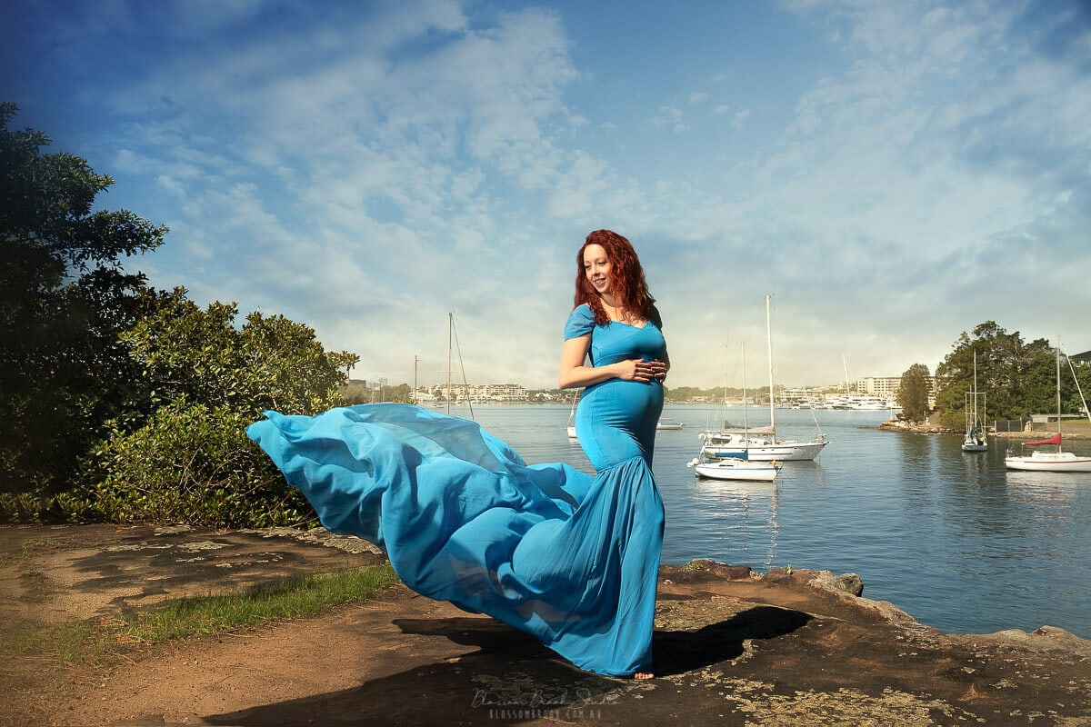 maternity photo outdoor bay view in blue dress